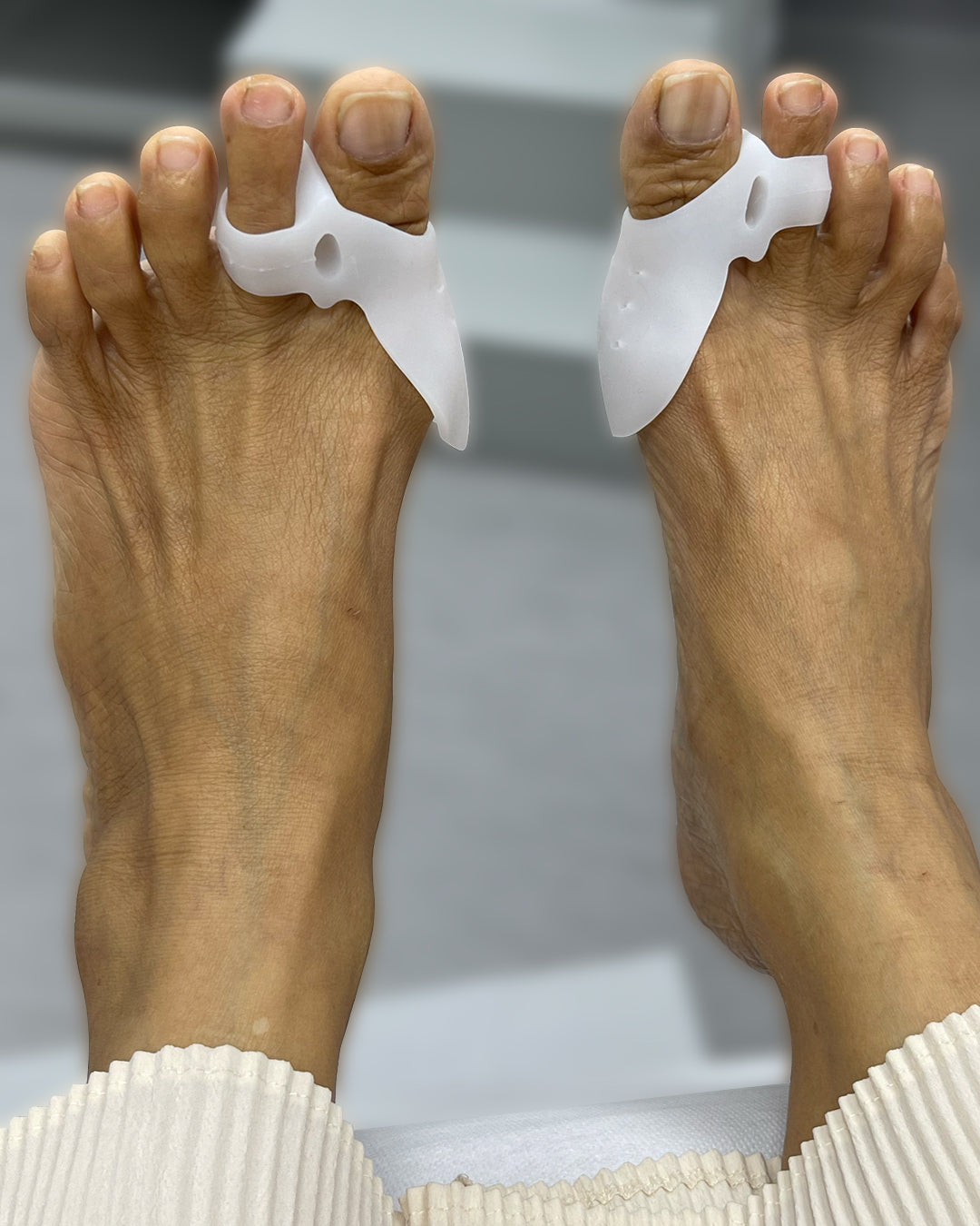 Mini bunion protector worn on foot to reduce friction from footwear